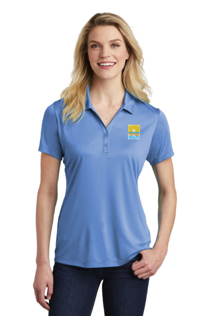 Female Model Wearing LST550 Polo in Carolina Blue